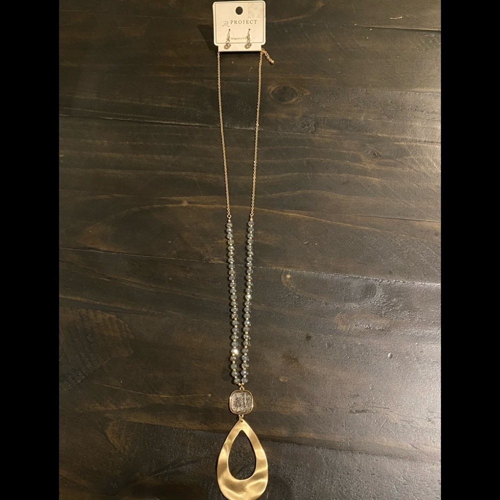 Long beaded necklace with earrings.